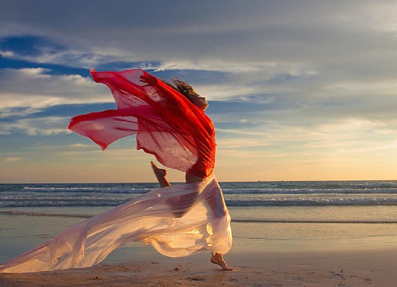 Woman Dancing on Beach — Red
