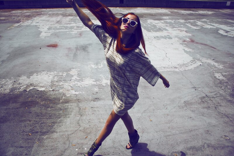 woman dancing on concrete