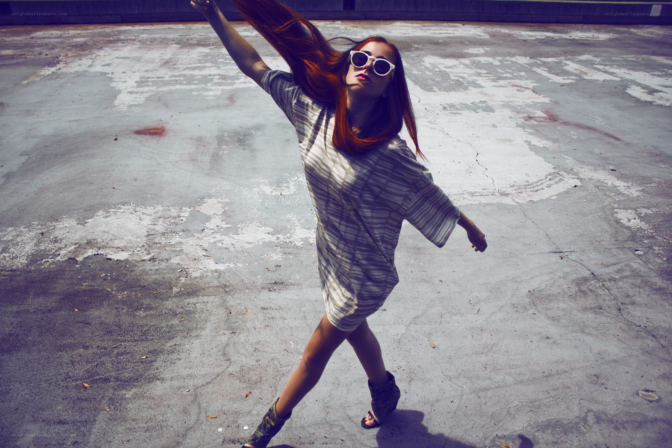 woman dancing on concrete