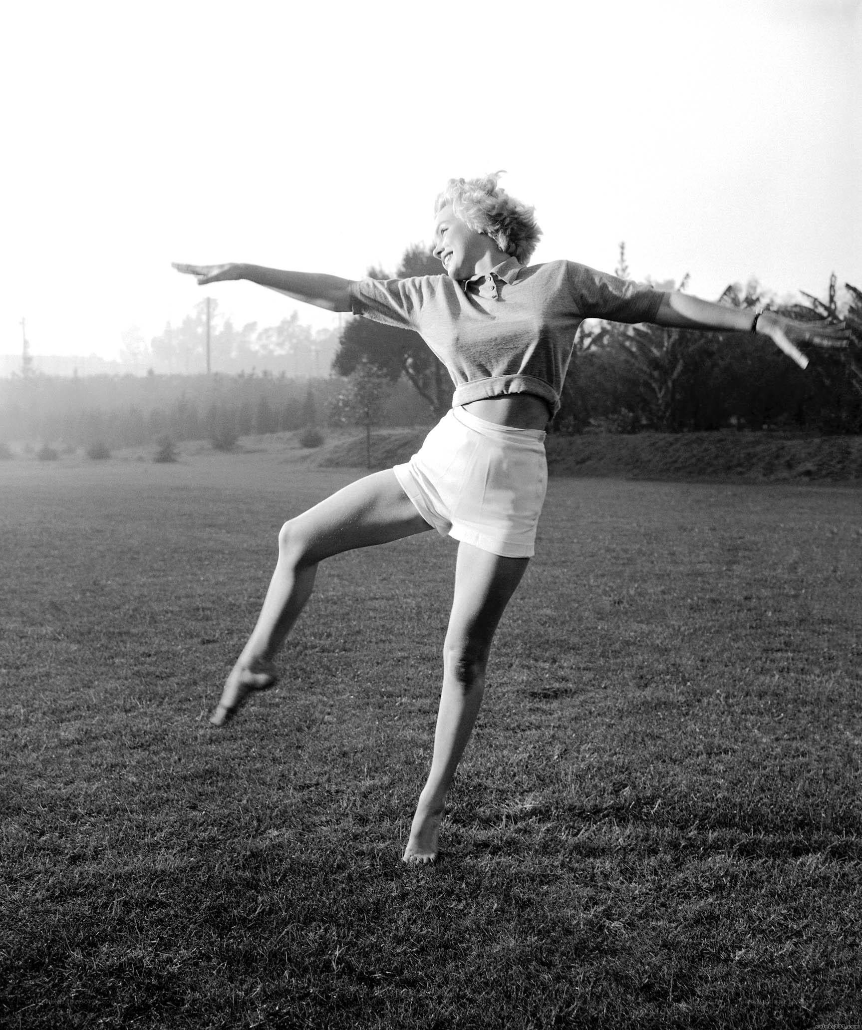 woman dancing on grass