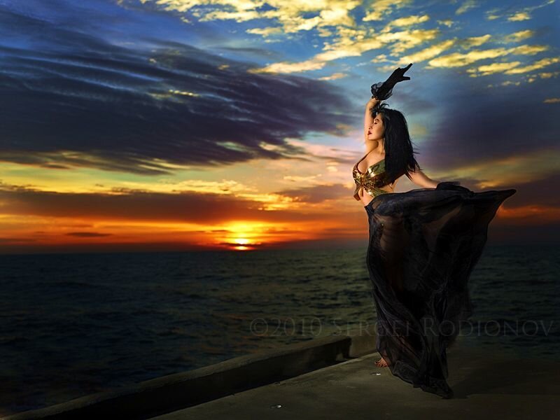 Woman Dancing on Pier