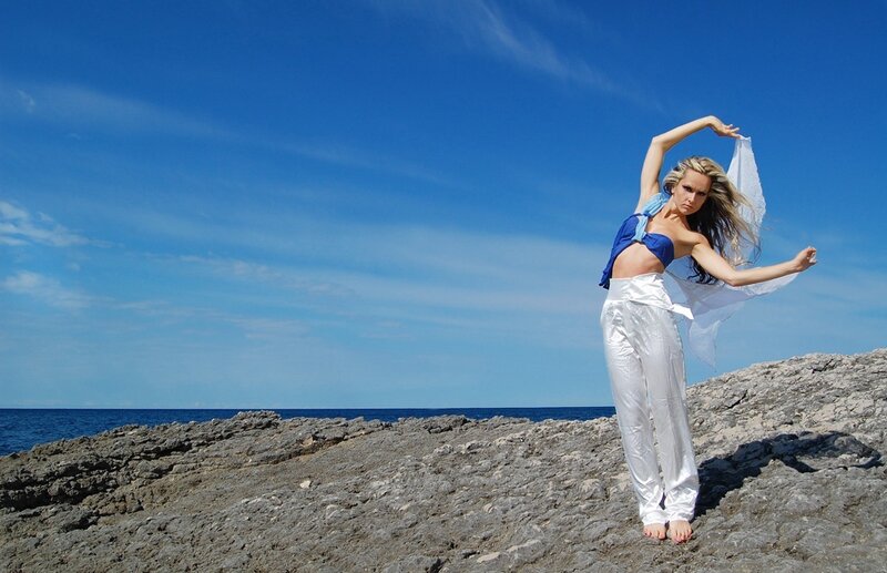 Woman Dancing on Rocks