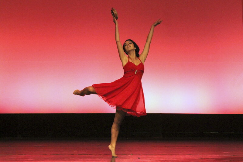 Woman Dancing on Stage — Red, Dramatic