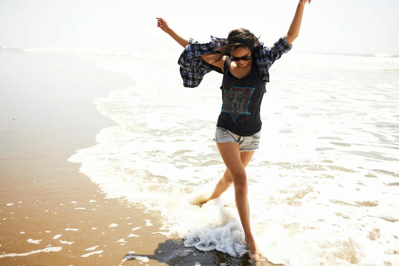 Woman dancing on the beach