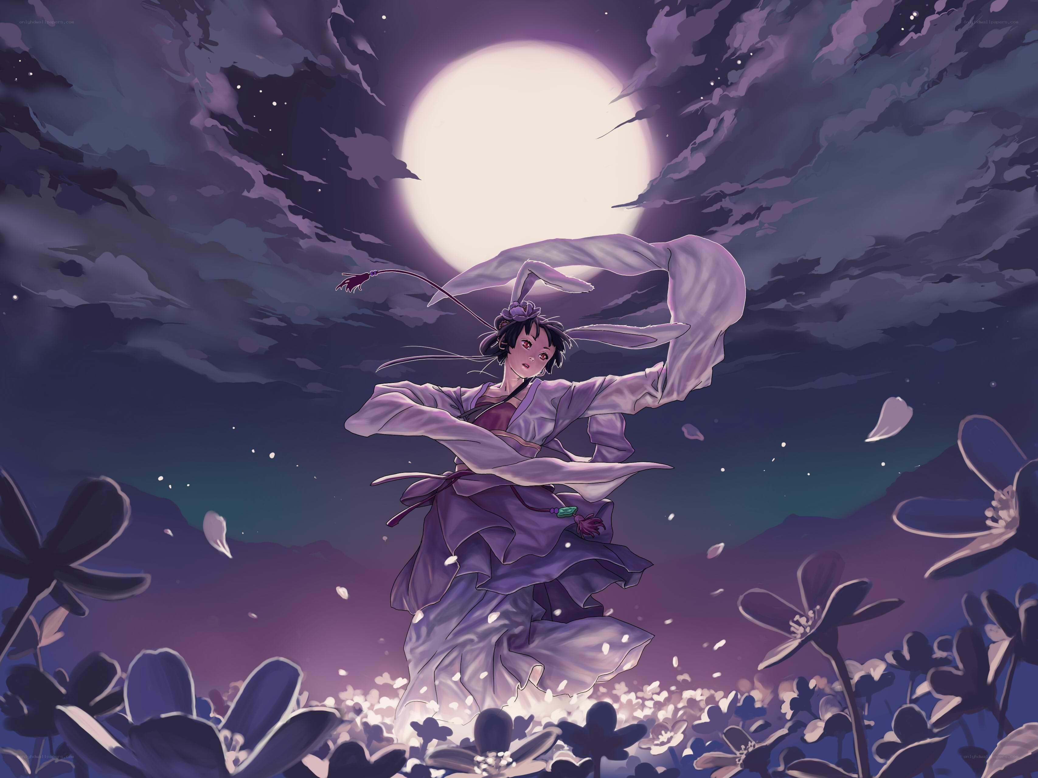 woman dancing under moonlight