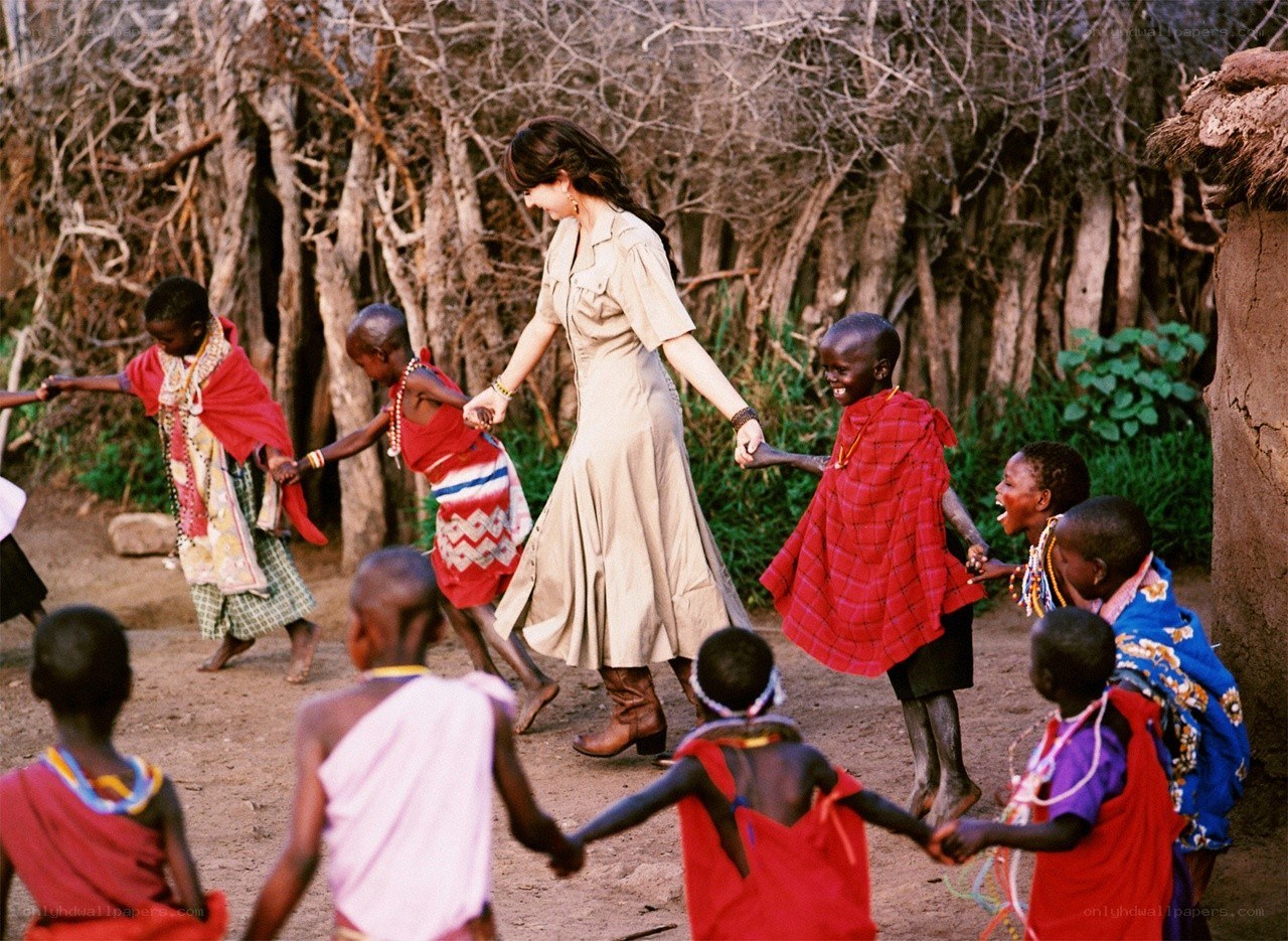 woman dancing with children