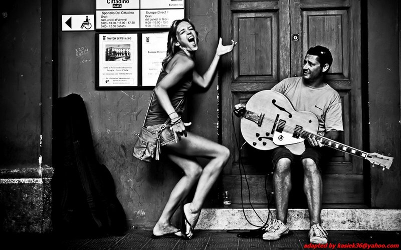 Woman Dancing with Guitarist