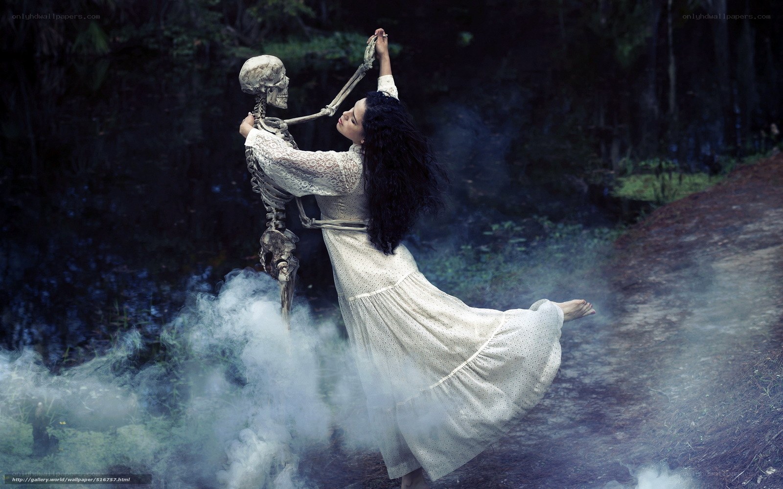 woman dancing with skeleton