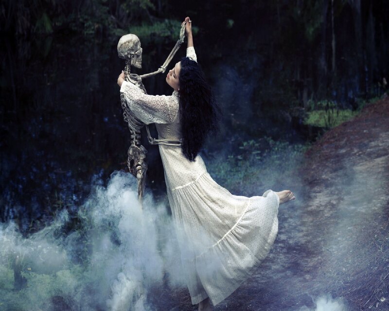 Woman Dancing with Skeleton — White