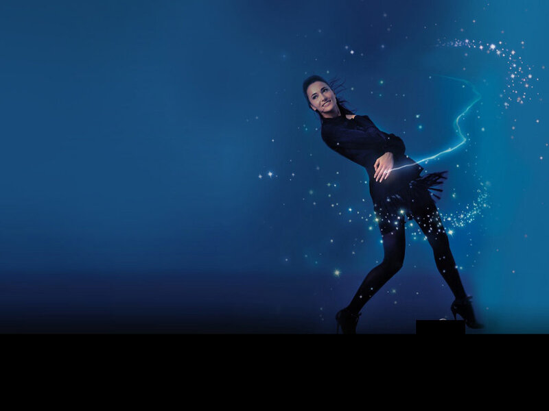 woman dancing with sparkles