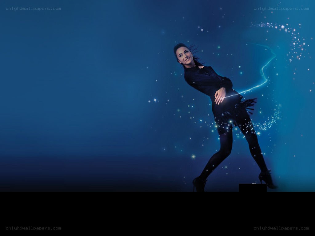 woman dancing with sparkles