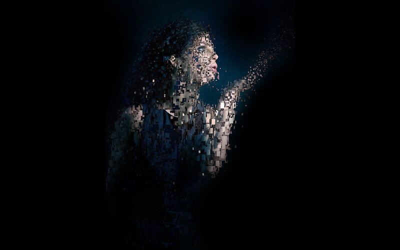 woman dissolving into pixels