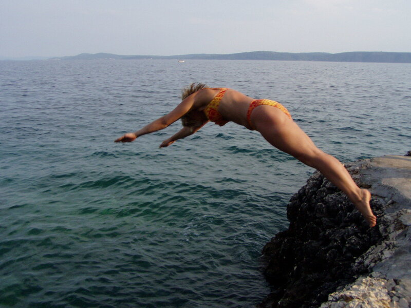 Woman Diving into Water