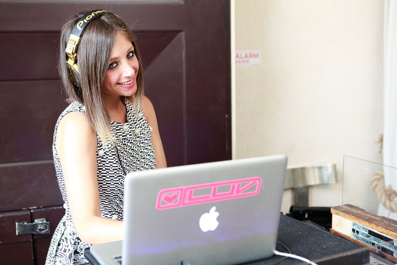 woman dj at laptop