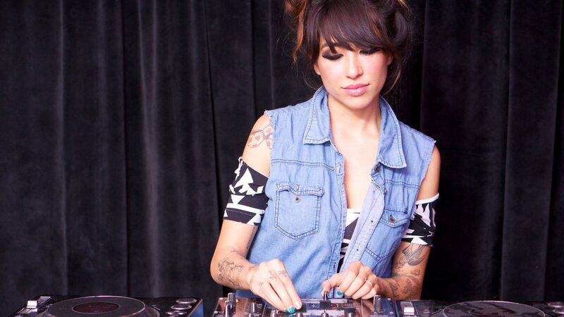 Woman DJ at Turntables — Blue