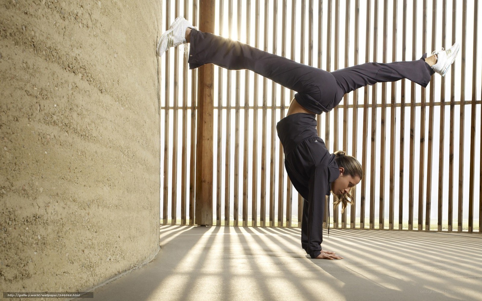 woman doing handstand exercise