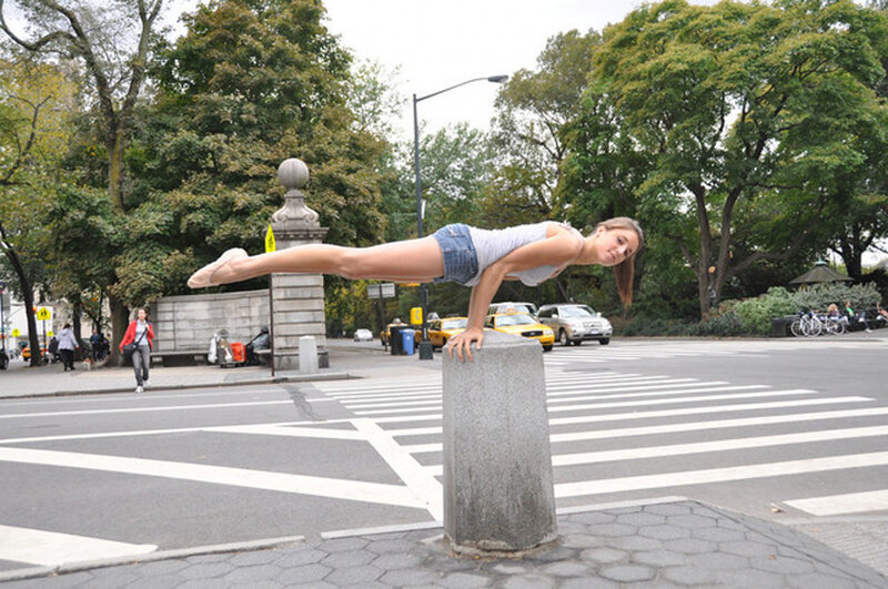 Woman Doing Handstand — Gray