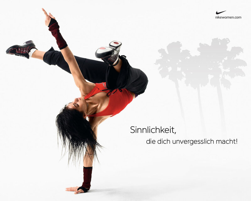 Woman doing handstand in Nike ad