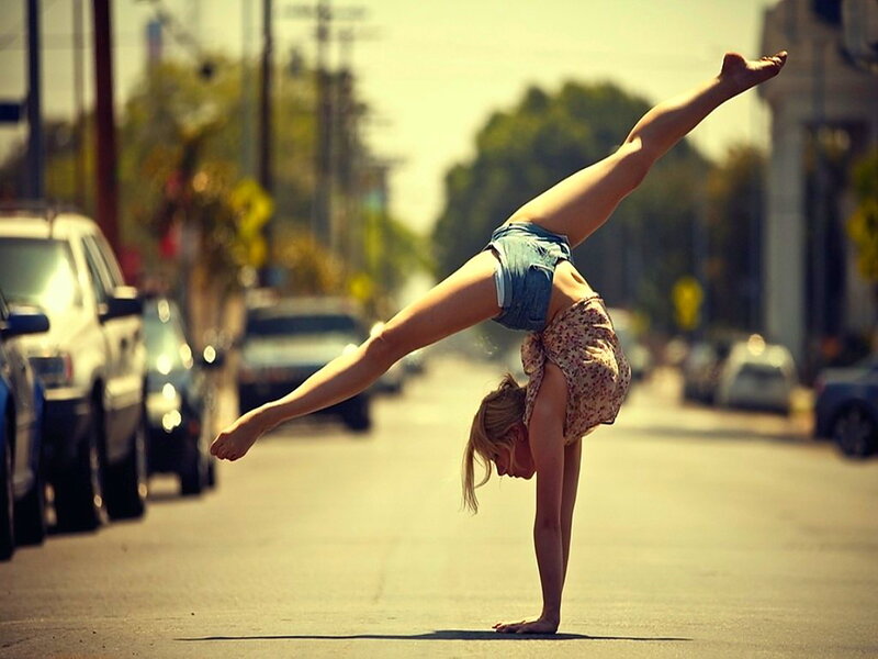 Woman Doing Handstand — Yellow