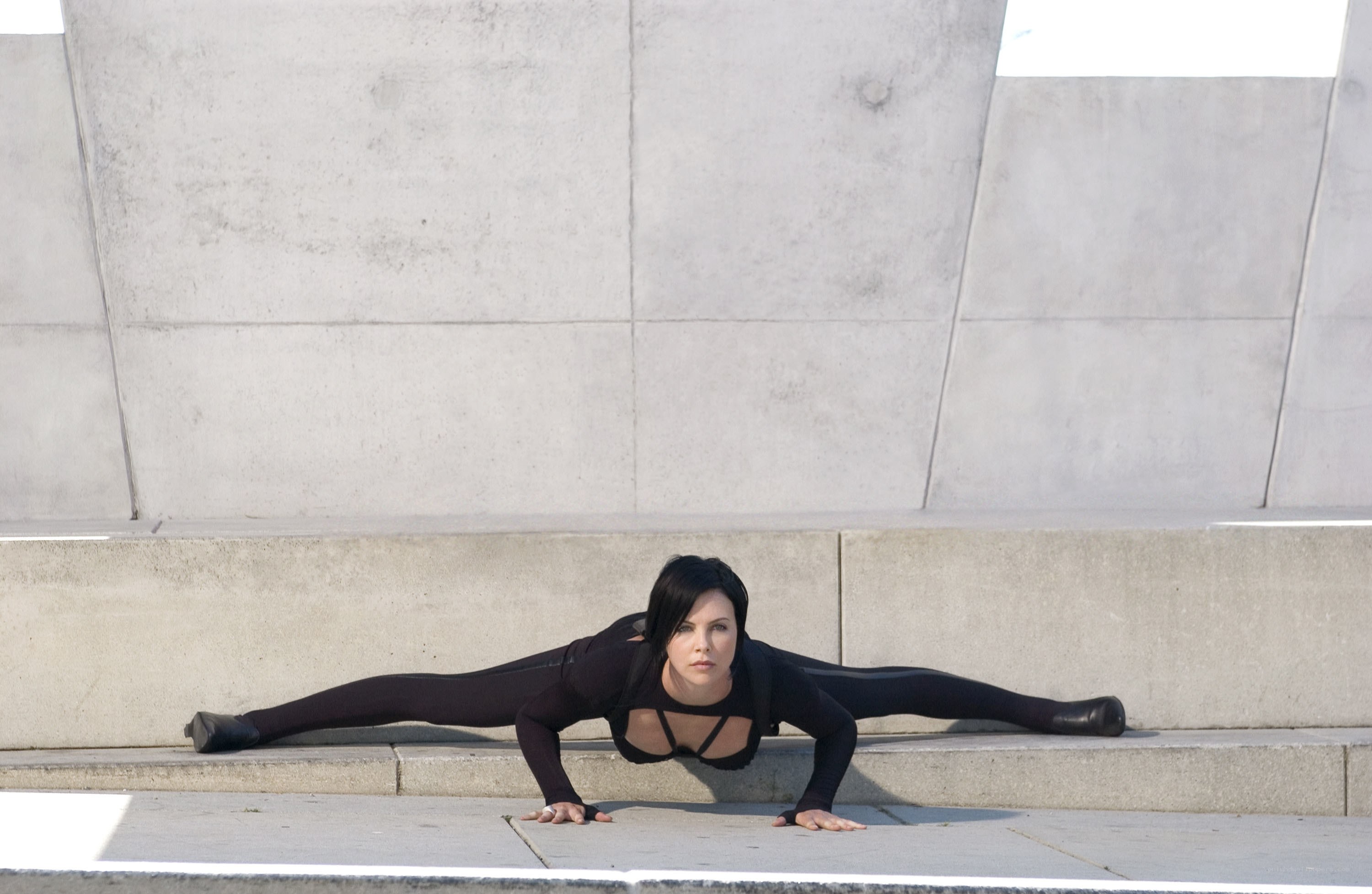woman doing split on steps