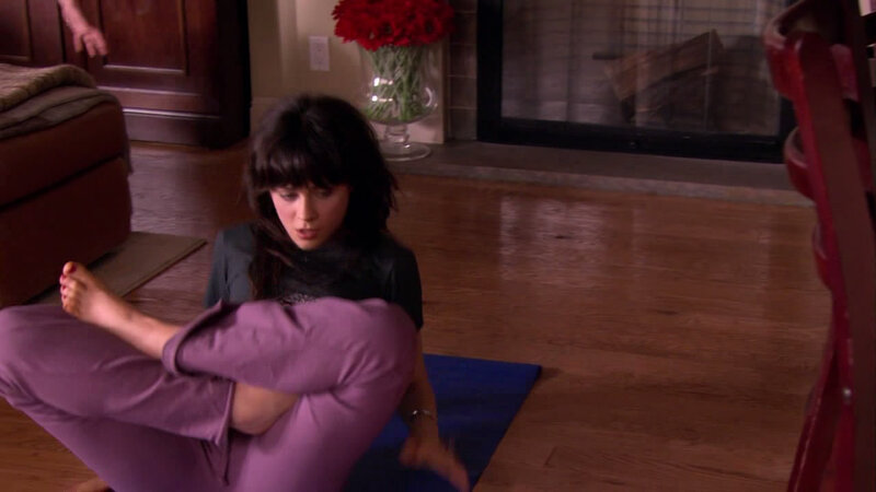 woman doing yoga at home