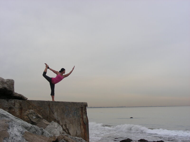 Woman Doing Yoga on Wall