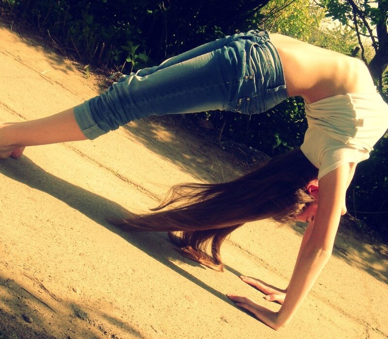 woman doing yoga outdoors