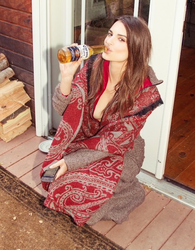woman drinking beer on porch