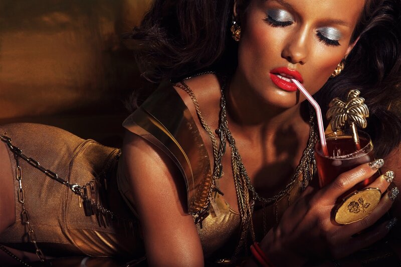 Woman Drinking Cocktail — Gold
