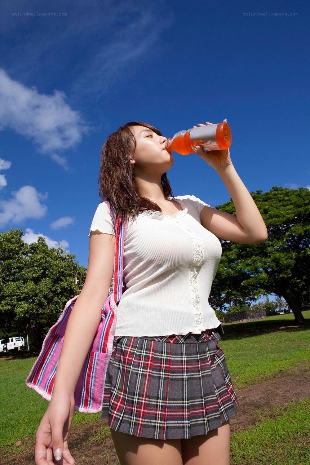 Woman drinking from a bottle