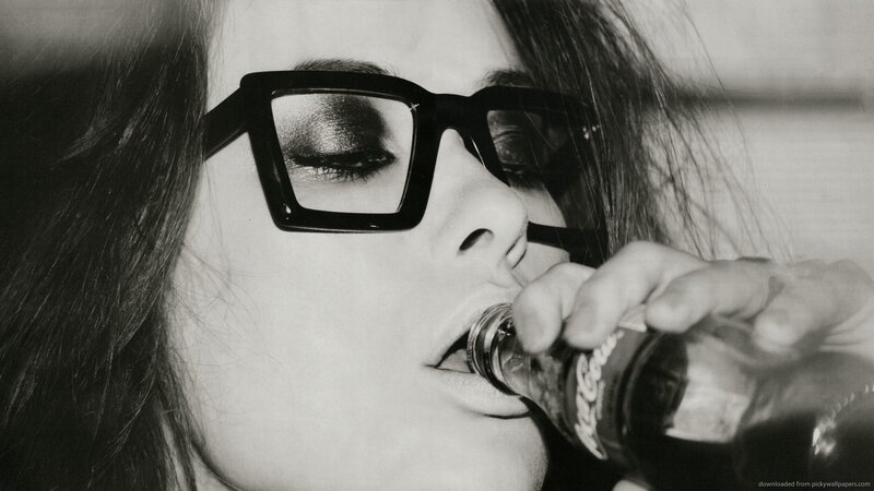 woman drinking from bottle