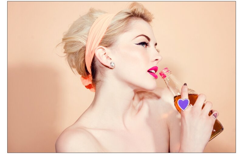 Woman Drinking from Bottle — Peach