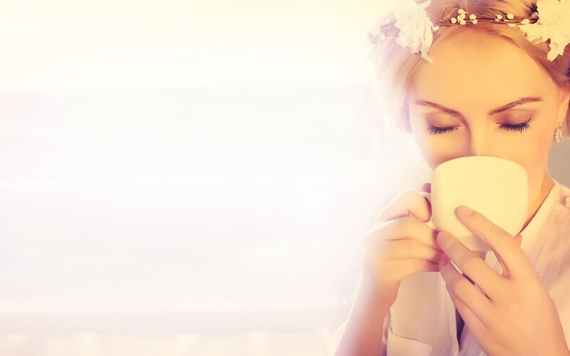 Woman Drinking from Cup — White