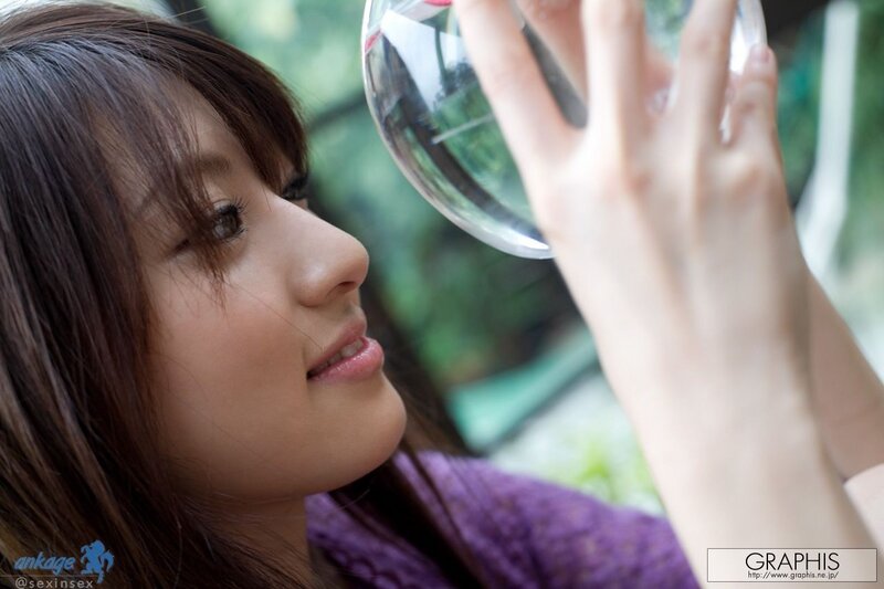 woman drinking from glass
