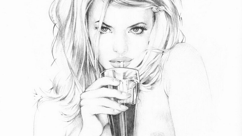 woman drinking from glass