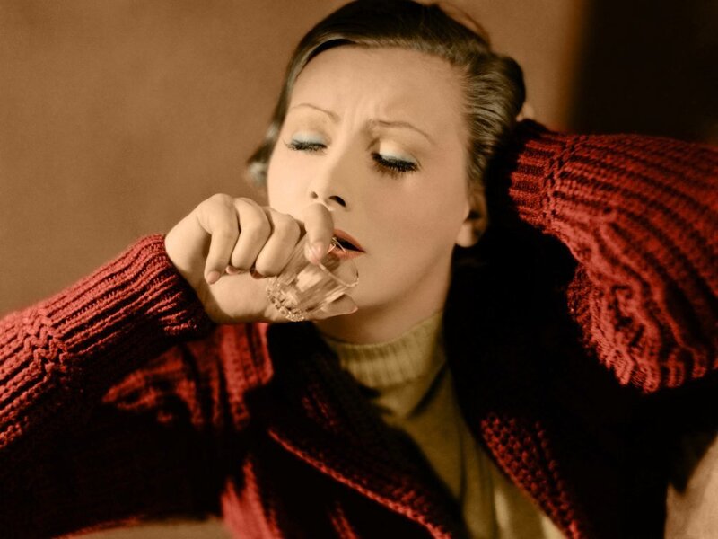 Woman Drinking from Glass — Red