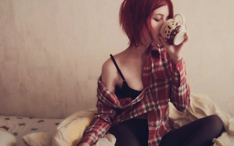woman drinking from mug