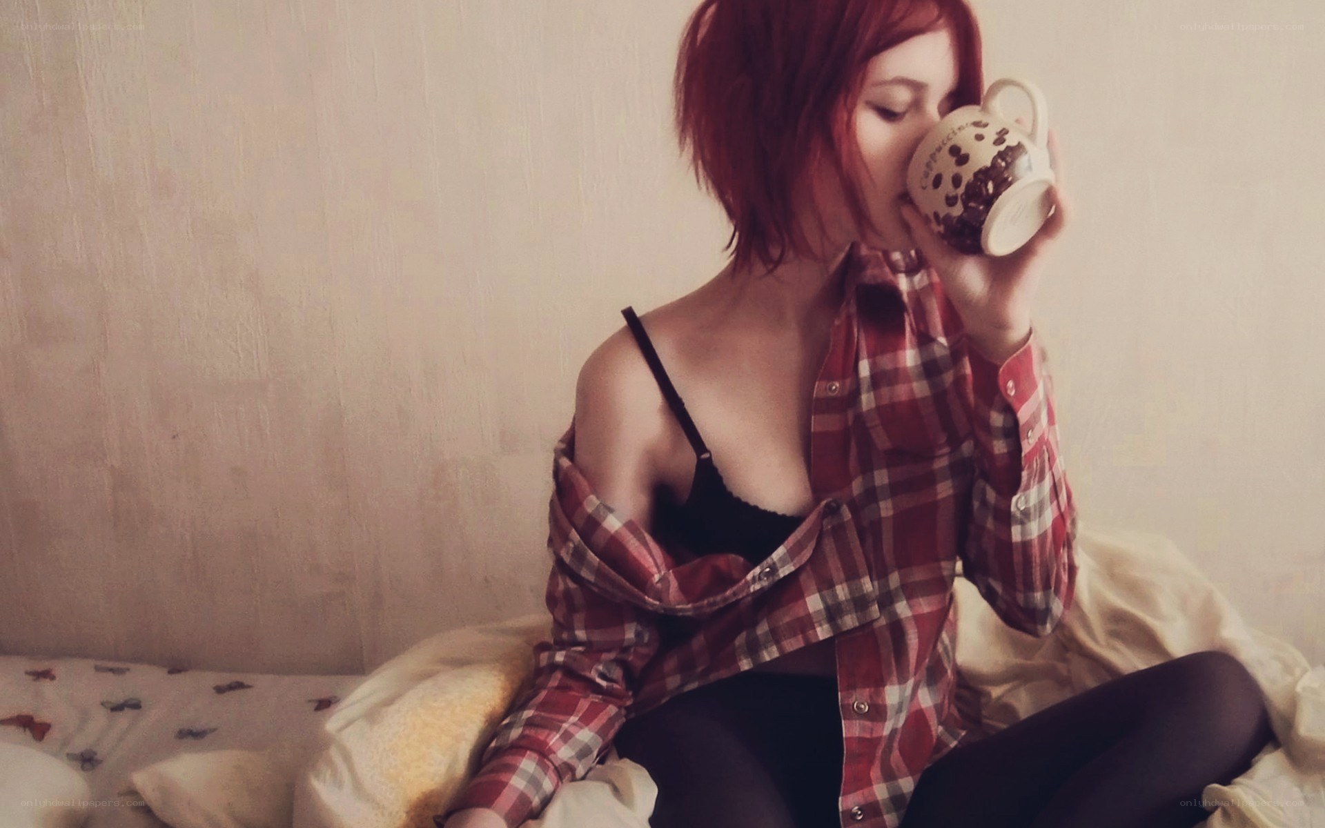 woman drinking from mug
