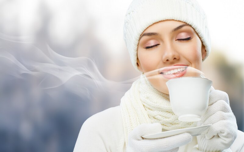 Woman Drinking Hot Beverage — White