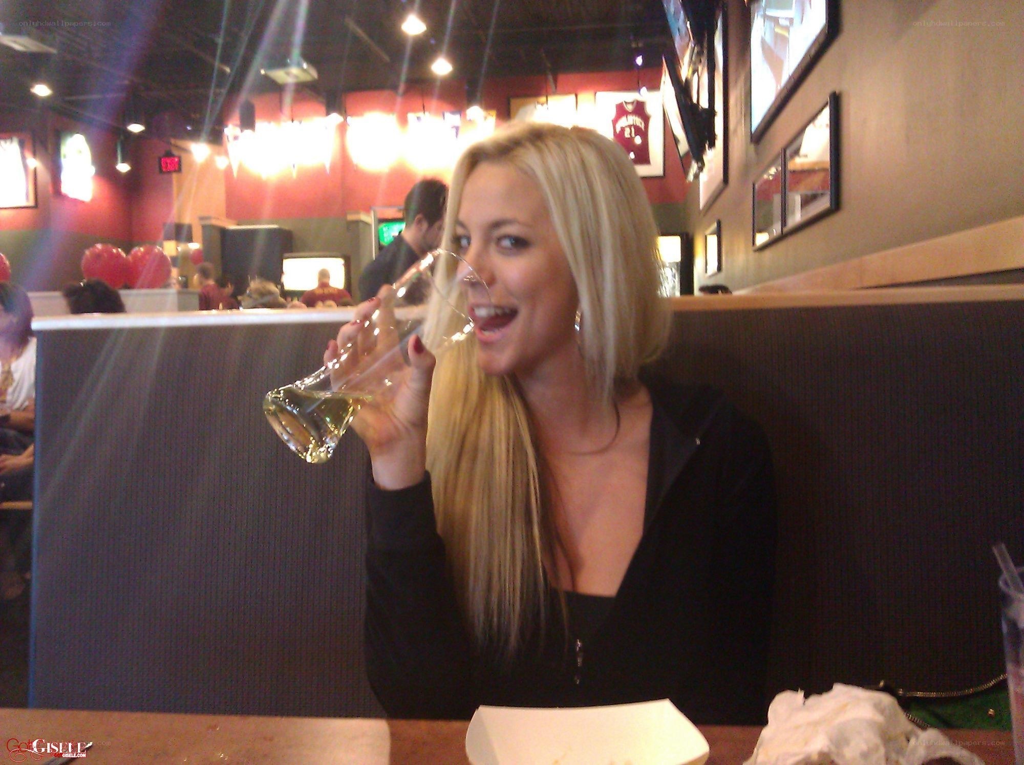 woman drinking in restaurant
