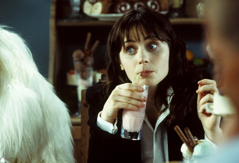 woman drinking milkshake