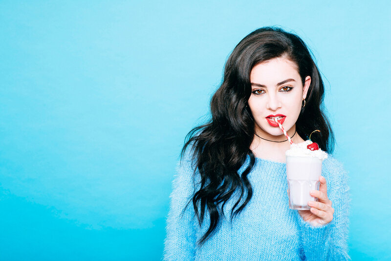 woman drinking milkshake