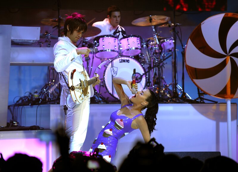 Woman Drinking on Stage