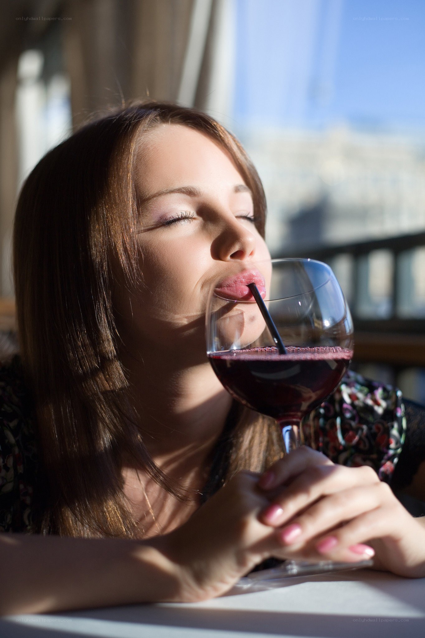 woman drinking red wine