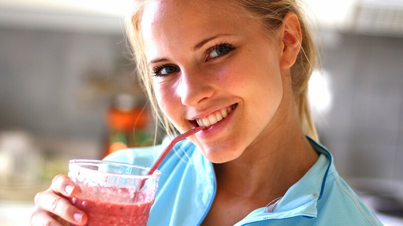 Woman Drinking Smoothie — Blue, Happy