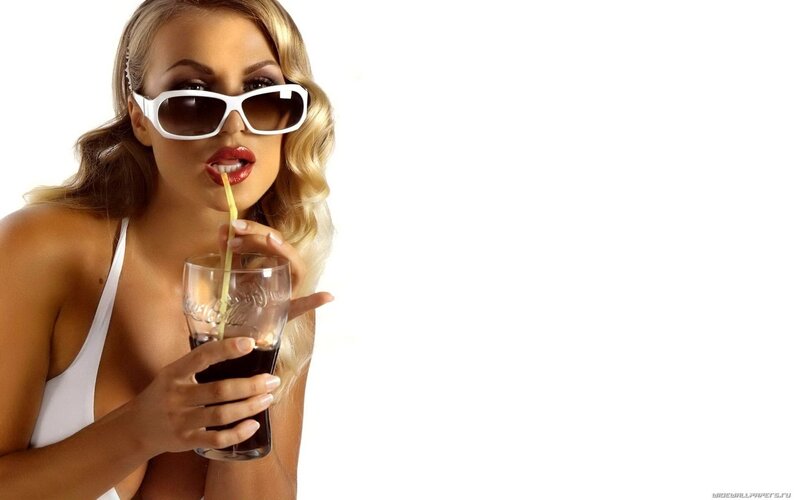 woman drinking soda with sunglasses