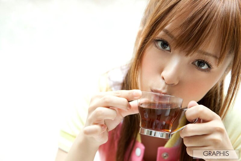 Woman Drinking Tea — Brown