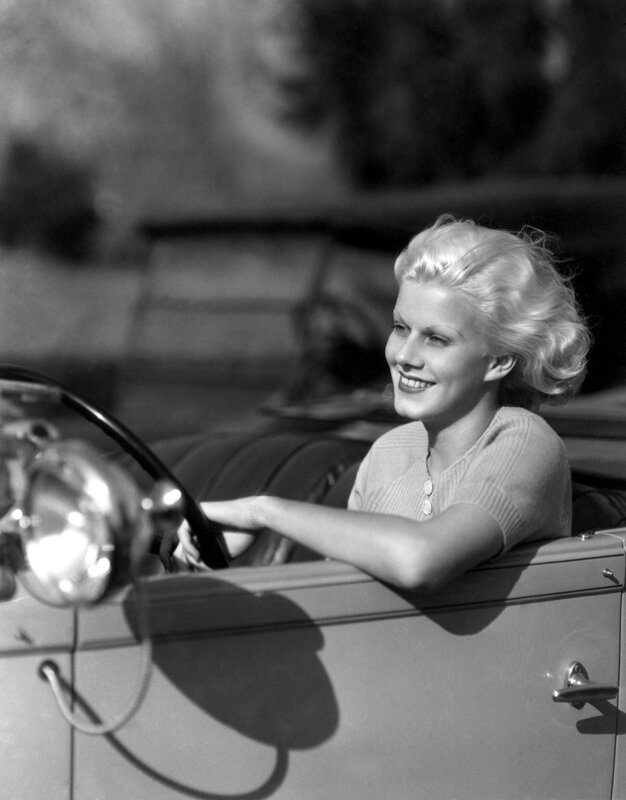 Woman driving a convertible