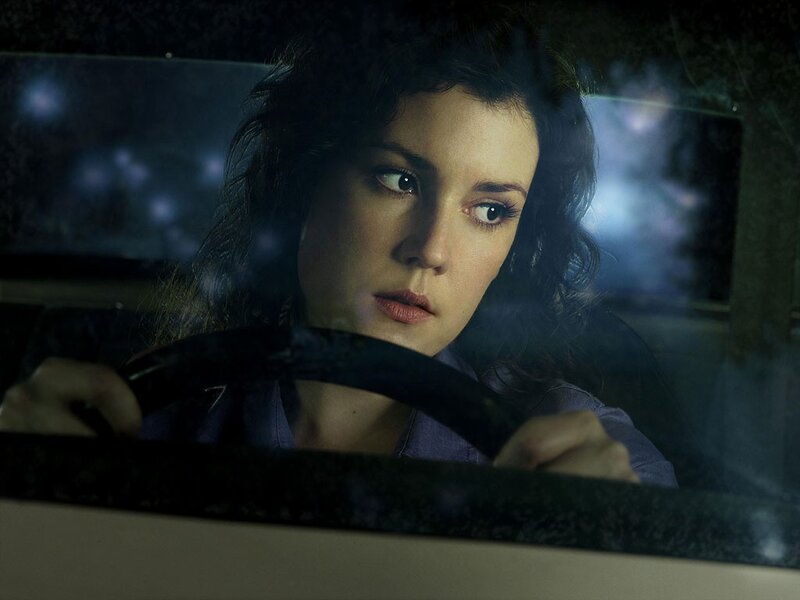 woman driving at night