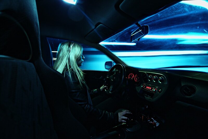 woman driving at night
